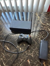 Working Microsoft Xbox 360 E 250GB with controller and cables