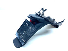 ORIGINAL KENNZEICHENHALTER HINTEN HONDA SH 125-150 2005-2007 GEBROCHENER HAKEN