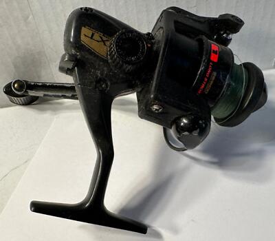 Moulinet de pêche vintage Zebco Quantum SS long stroke snapshot visage