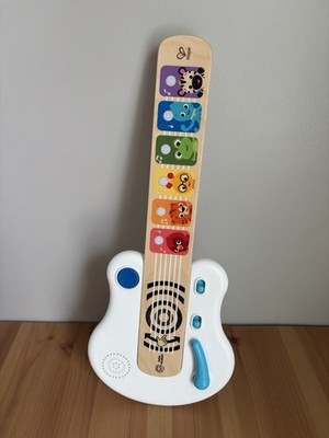 Hape Baby Einstein Light Up Strum Along Magic Touch Wooden Guitar