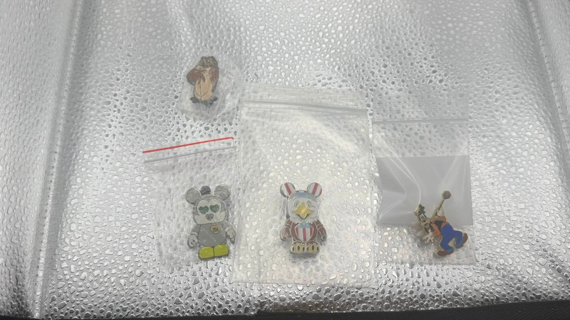 Lot of 4, random disney brand pins. all never worn
