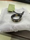 Gucci Icon 18ct Yellow Gold And Black Metal Ring Size 22