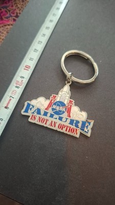 NASA space program FAILURE IS NOT AN OPTION rocket ship metal charm keychain