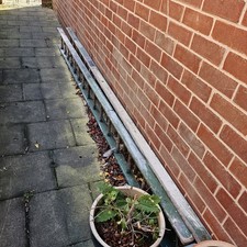 Double extending wooden ladder 13ft when closed,  approx  23ft when extended.