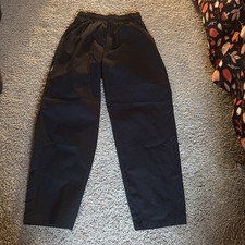 PANTALONES CHEF color negro liso con bolsillos delanteros y traseros cintura elástica M talla 34X32