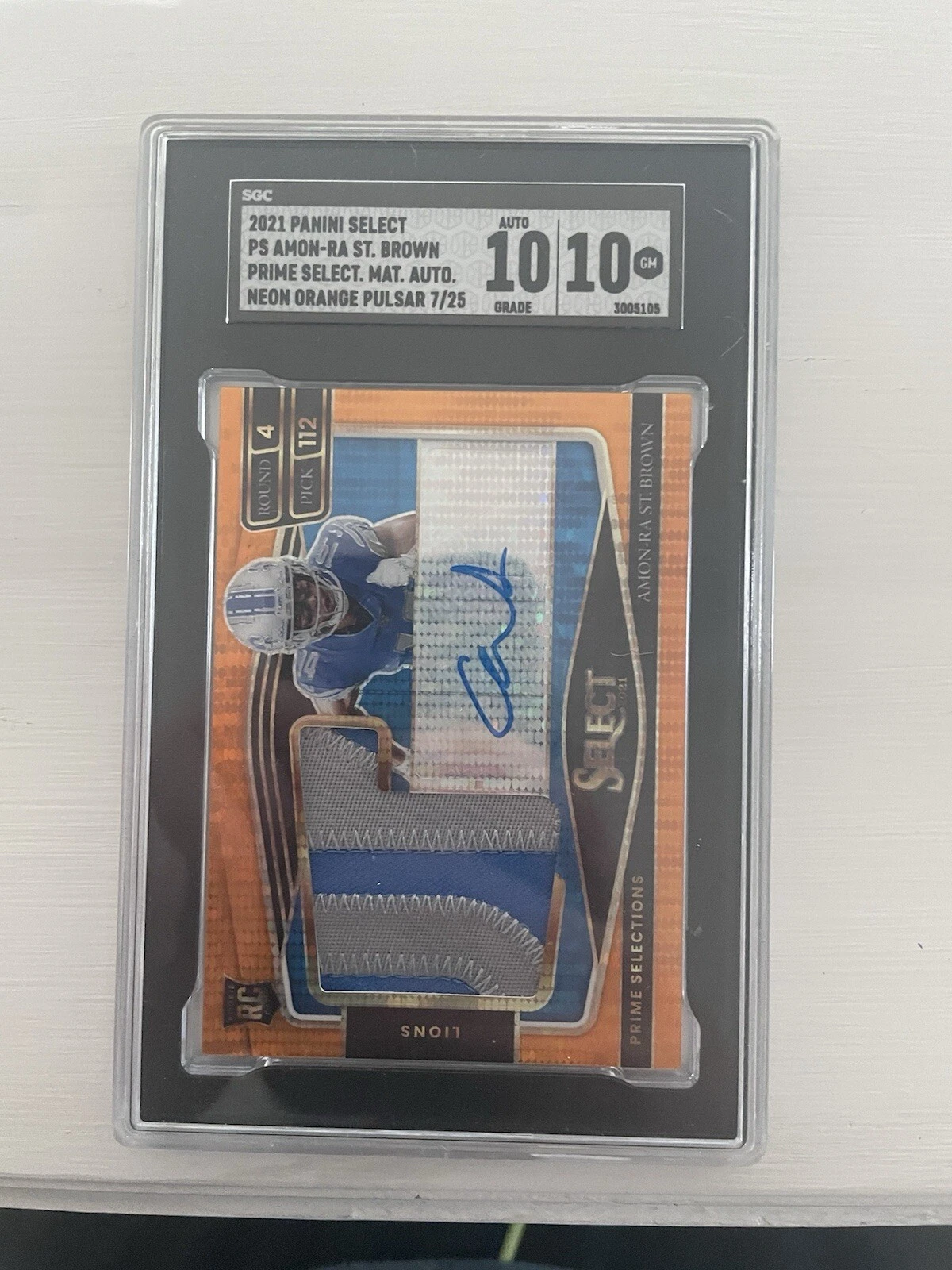 Amon-Ra St. Brown Panini Select Prime Selections Signatures #PSAST Neon Orange Pulsar Prizm
