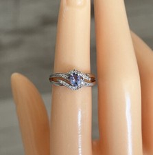 9ct White Gold 0.4ct Tanzanite & 0.1ct Diamond Cluster Ring, UK size J