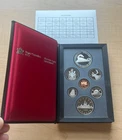 1986 Royal Canadian Mint 7-coin, double dollar proof set with 50% silver dollar