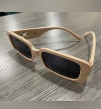 Blush pink square sunglasses with gold flower accents
