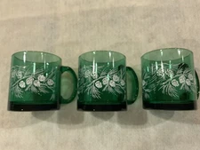 Vintage set of 3 teal/evergreen glass mugs by “Libby” with embossed Pinecones