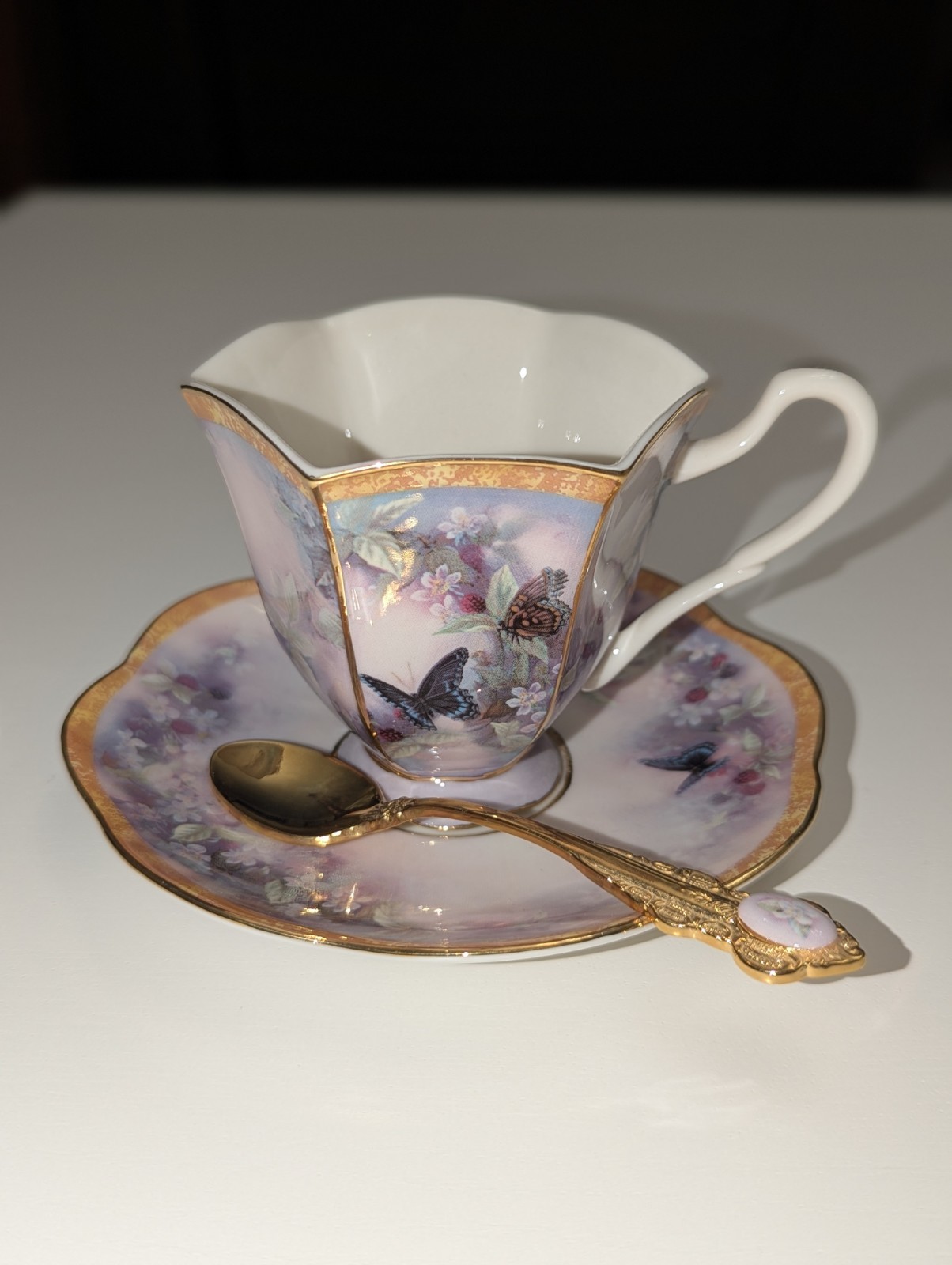 Elegant Porcelain Floral Tea Cup Set with Gold Trim and Spoon