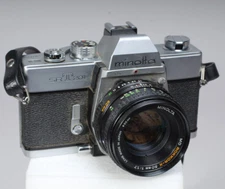 MINOLTA SRT-201 35MM SLR W 50MM F/1.7 ROKKOR-X NEEDS WORK