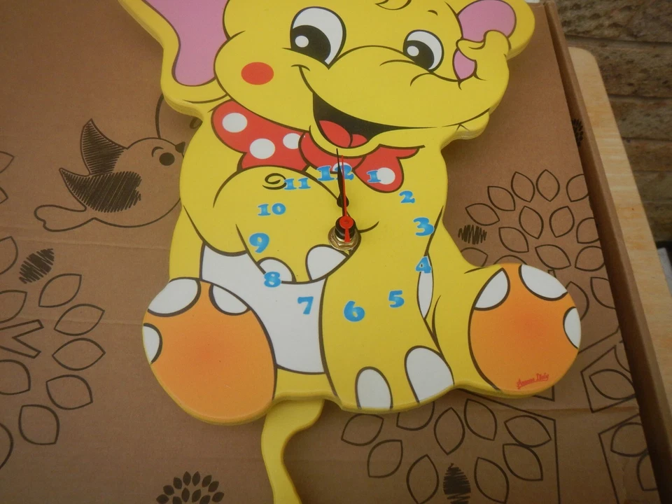 RELOJ DE PARED ARACNE ITALIA, HECHO A MANO NIÑOS ELEFANTE MADERA NUEVO AMARILLO Foto 4 de 4