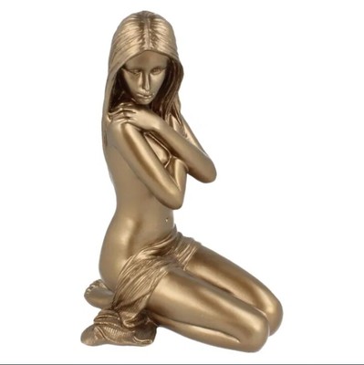 Figurine of a naked girl made of bronze-plated polystone .Leonardo Collection