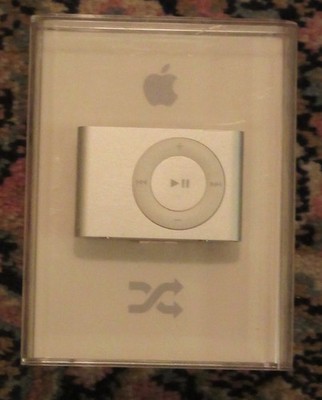 Apple iPod Shuffle 1GB MB225LL/A, New-Sealed-Never opened; earphone/dock bundle