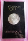 1882-CC MORGAN SILVER DOLLAR. GSA HOLDER. HIGH GRADE. NO BOX OR COA.