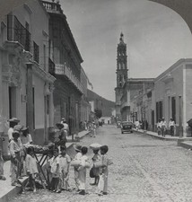 Niños comprando dulces y frutas Tepic México piedra angular primaria Stereoview c1920