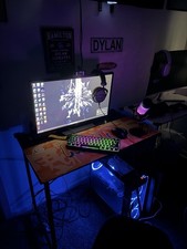 Gaming PC Setup Includes Monitor, Power Supply, and Accessories