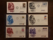 LOT OF 25 1982-1989 FIRST DAY ISSUE STAMP ENVELOPES - SOME IN PLASTIC SEALS (1)