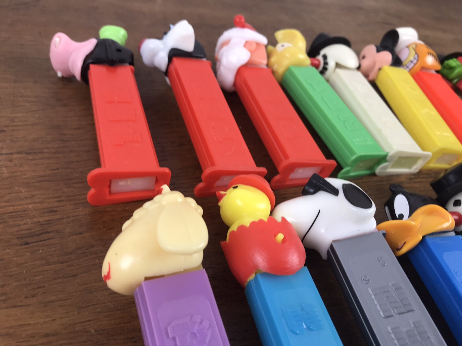 Lot of 21 PEZ Dispensers Tweetie Snowman Lamb Santa Mickey TMNT Lighter & More
