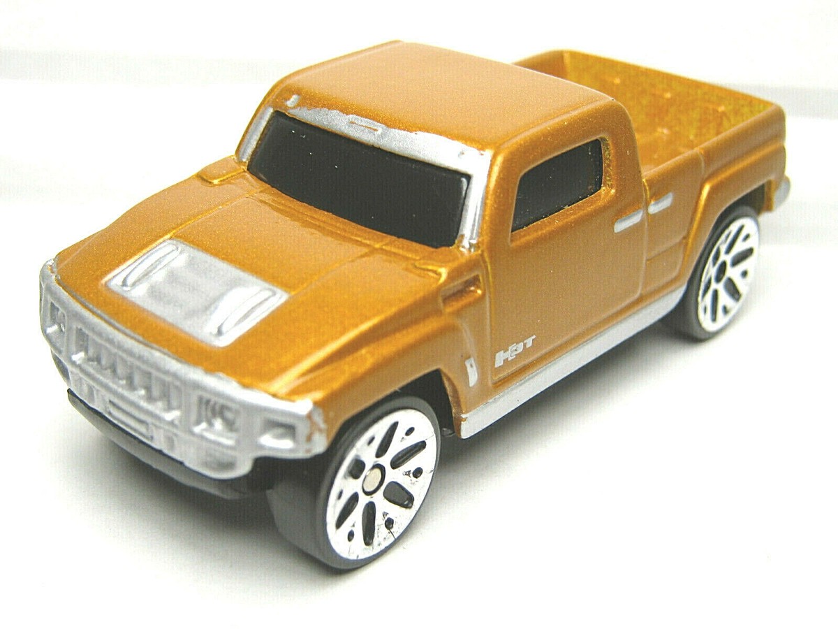 MAISTO 2004 HUMMER H3T CONCEPT 1:64 BROWN FLAKE 3/4
