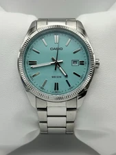 Casio MTP‑1302 Turquoise Dial Stainless Steel Men’s Watch Date WR 50M