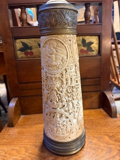 ANTIQUE METAL MOUNTED TANKARD WITH CARVED BODY POSSIBLY GERMAN