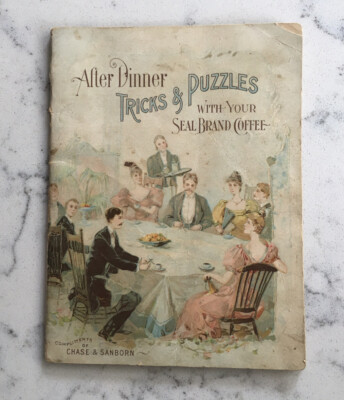 ANTIQUE ADVERTISING BOOK AFTER DINNER TRICKS AND PUZZLES WITH SEAL BRAND COFFEE