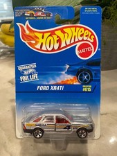 1996 Hot Wheels Blue/White Card #615 FORD XR4TI Silver w/Chrome 5 Spoke Wheels