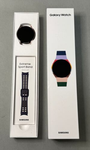 Samsung Galaxy Watch5 40 mm GPS + LTE étui or rose neuf avec bracelet sport extrême marine - Photo 1 sur 1