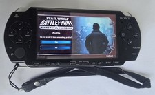 Sony PSP 2003 With Case,Charger, New Battery and Games and movies Working VGC