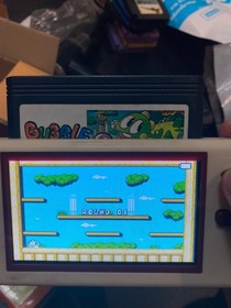 Famicom NES Set 2 Game Bubble bobble Part 1 (IC,Re-printed Label), Part 2 (Glob)