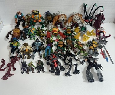 Lot of 31,  2000s TMNT Action Figures Raph, Donatello, Shredder + More