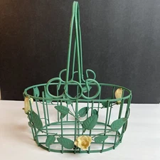 Green Wire Basket Oval Shaped w/ Leaves And Three Off White Flowers