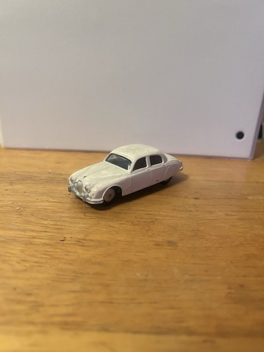 A Corgi Toys No. 208 Jaguar 2.4 litre saloon, finished in light green