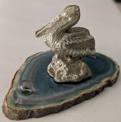 Pewter Pelican On A Polished Agate Slice With A Small Crystal Ball