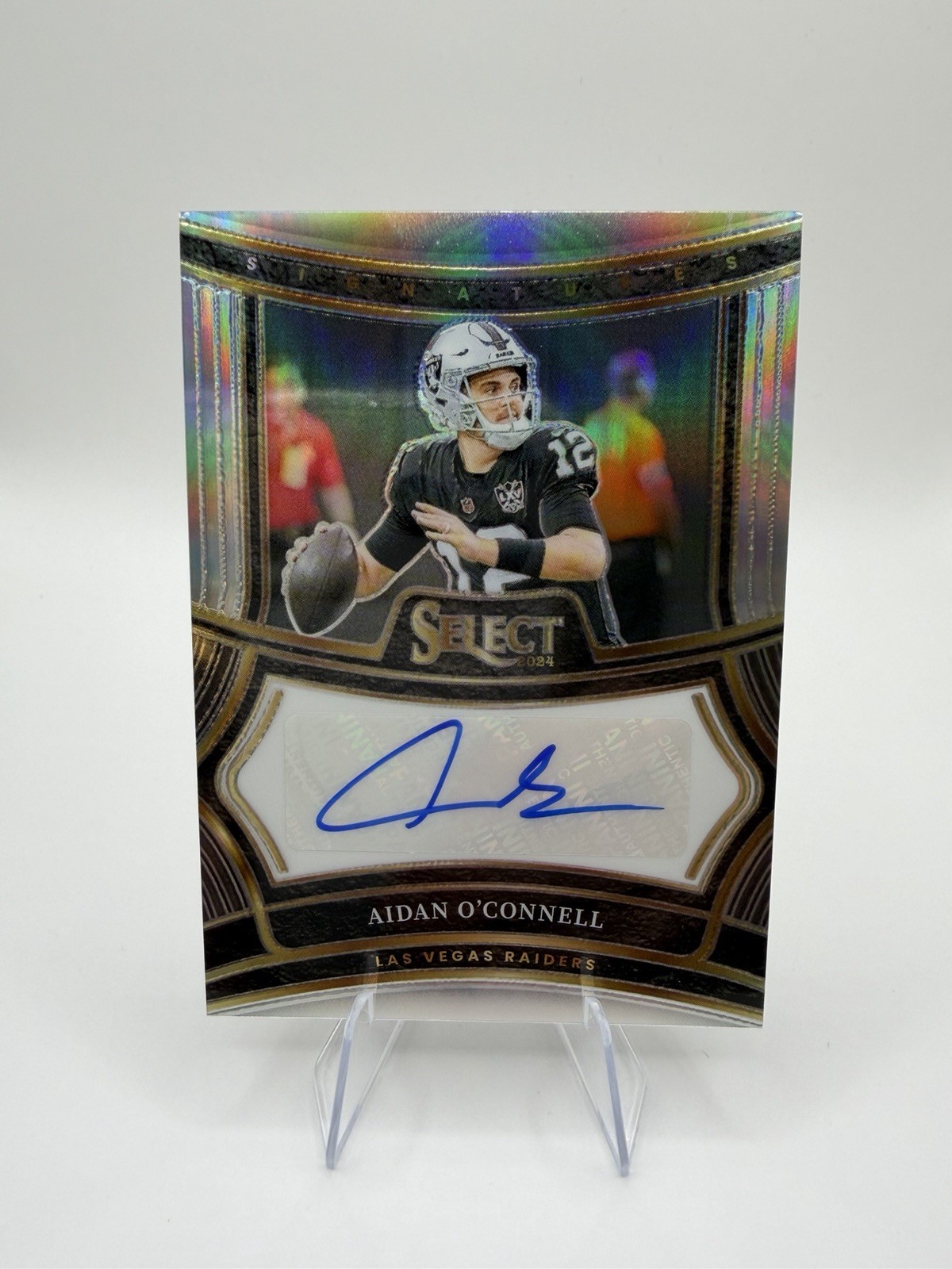 2024 Panini Select - Signatures Aidan O'Connell #SP-AOL Silver Prizm /399 (AU)