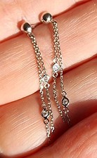 Beautiful 18ct white gold diamond by the yard bezel set chain dangle earrings