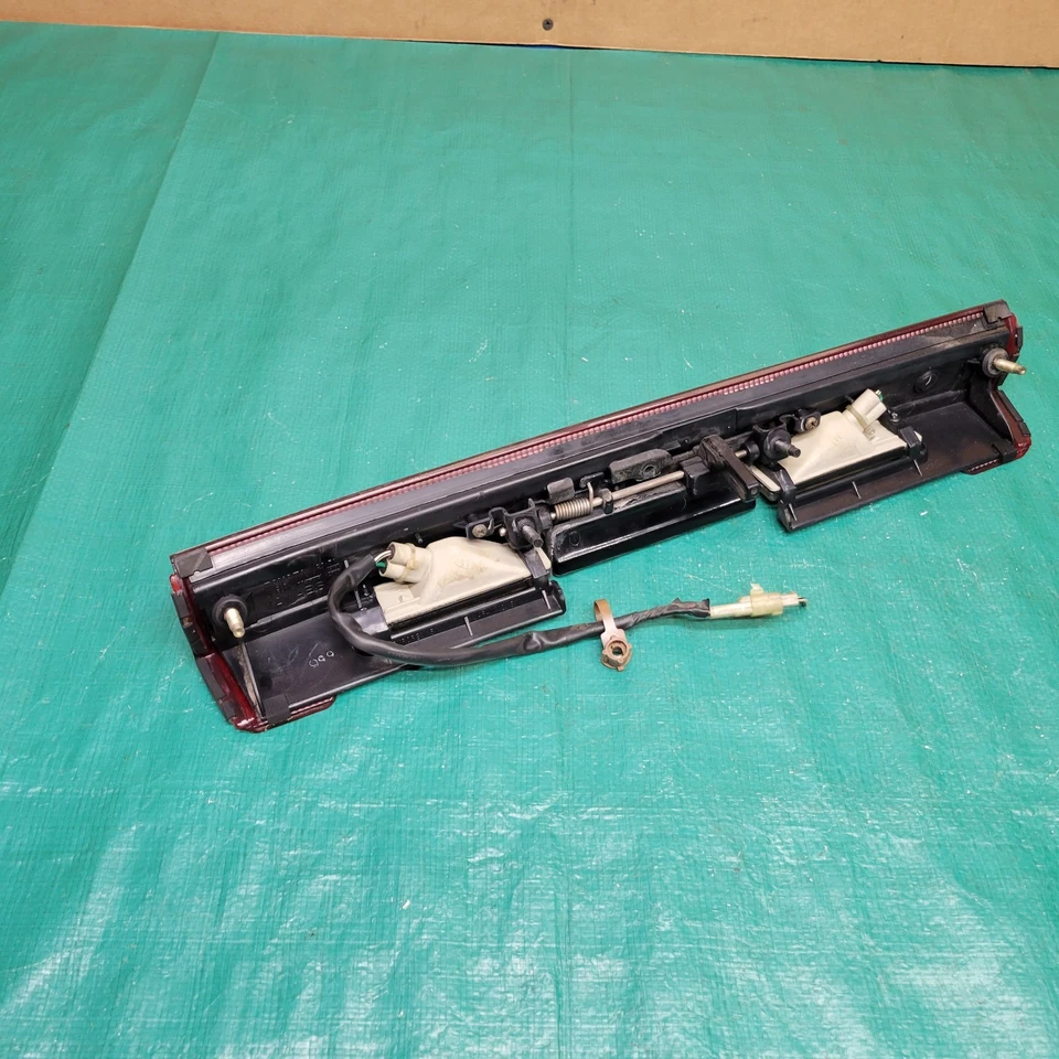 Toyota Previa 1991-1997 puerta levadiza manija moldura placa placa luces OEM 81276-28010 Foto 4 de 4