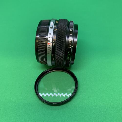 カメラ レンズ(単焦点) [Mint] Olympus OM-System G.Zuiko Auto-W f/3.5 28mm SLR Film Camera + Filter  #96