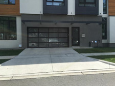 Full View [18'x7'] Black Anodized Aluminum & Tempered Frosted Glass Garage Door