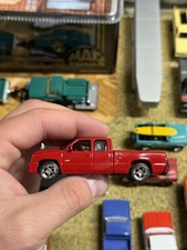 Autoworld 1/64th 2006 Chevy Silverado SS Vict...