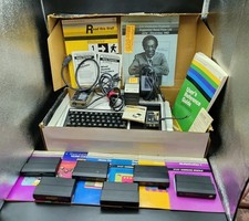 Texas Instruments TI-99/4A Computer With Games,guide,speech Synthesizer Etc.