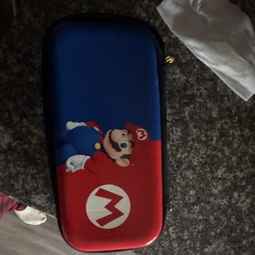 Nintendo Switch Handheld System Red Joy-Con Multiplayer with Mario Carrying Case