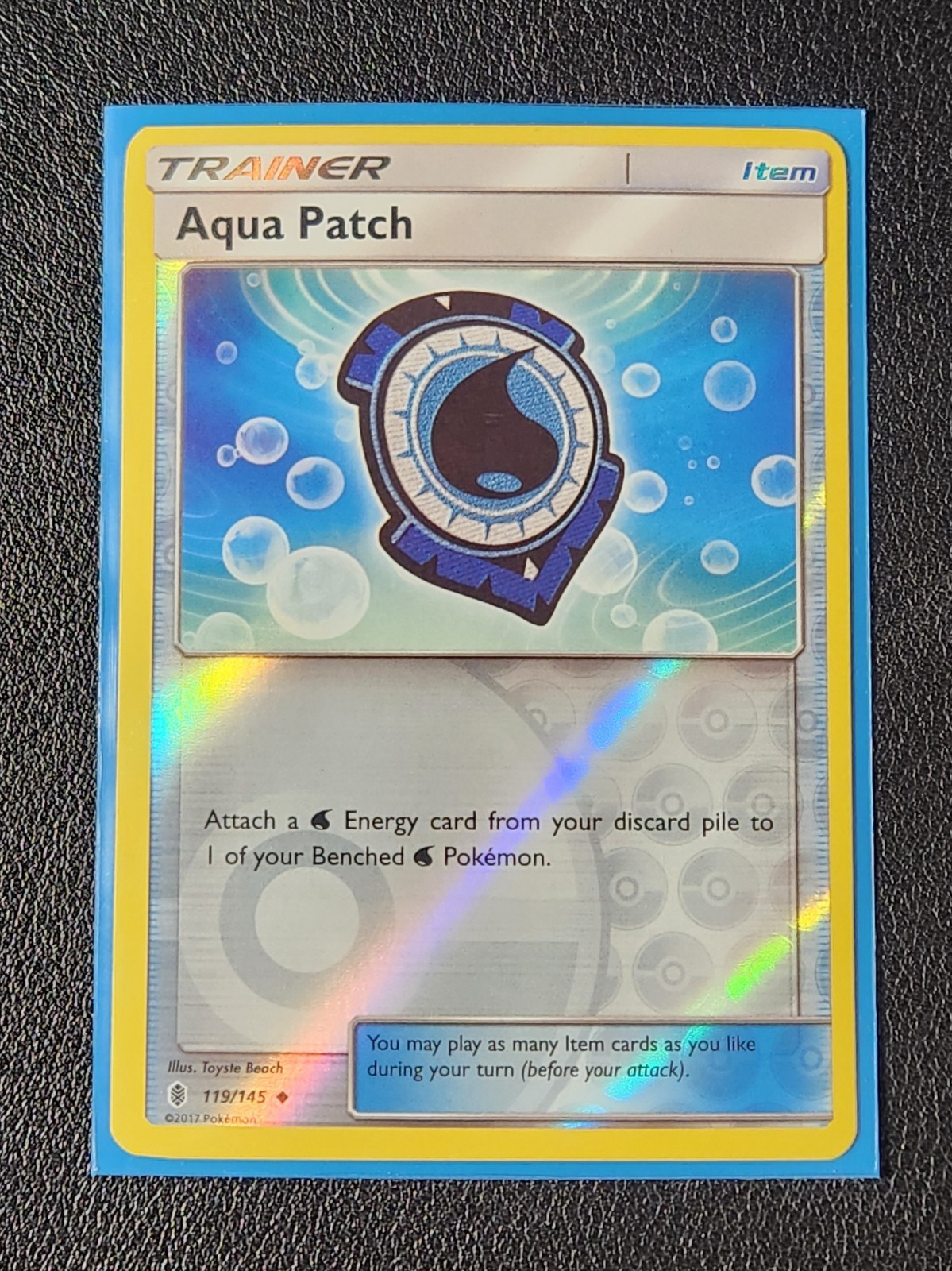 reverse holo Aqua Patch 119/145 Pokemon card SM Guardians Rising uncommon NM