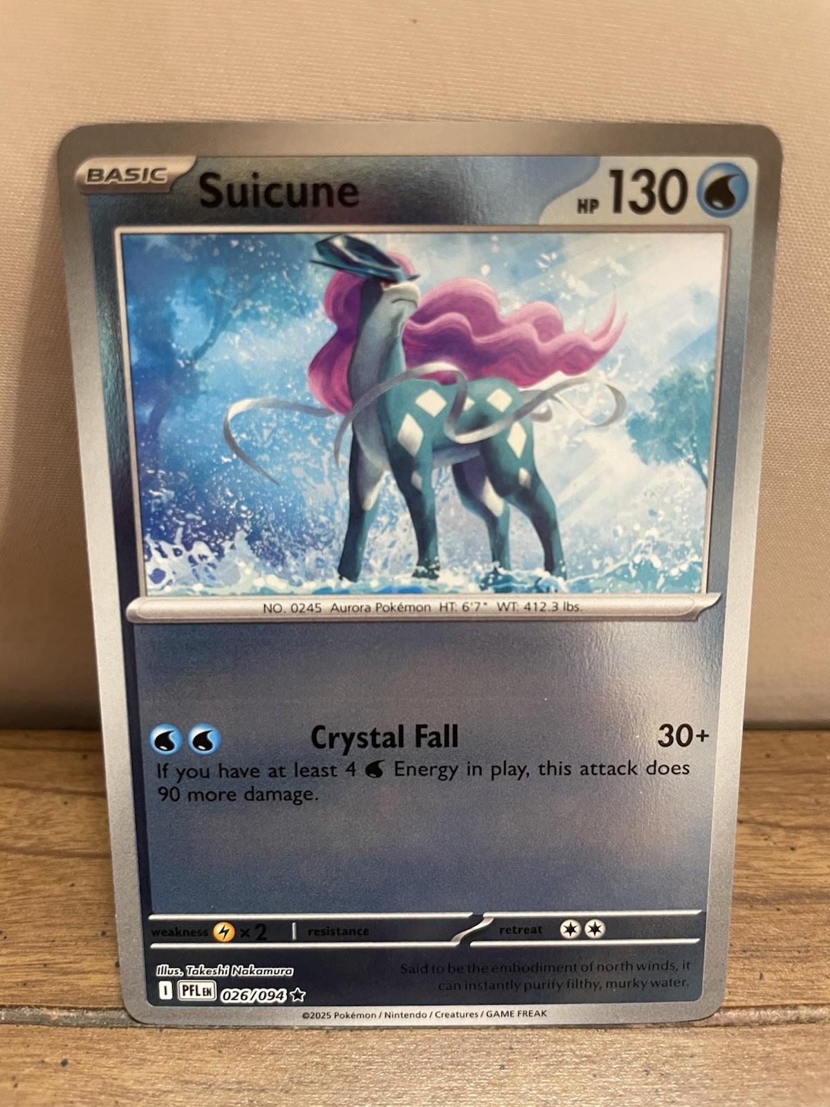 Suicune 026/094 Me02: Phantasmal Flames Reverse Holo