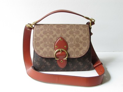 beat crossbody clutch in signature canvas with horse and carriage print