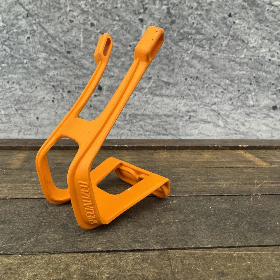 Jaula con clip de dedo del pie de pedal especializada de plástico naranja medio huérfano EE. UU. Bicicleta Bicicleta Foto 4 de 4