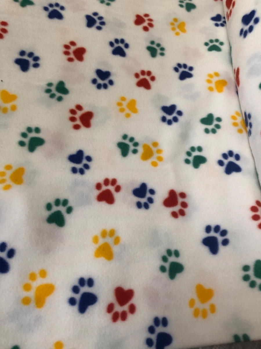 Partial bolt 7 yards Paw prints on white fleece fabric Cute as a button