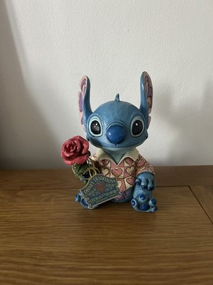 Jim Shore Disney Traditions Clueless Casanova Figurine - Stitch holding rose